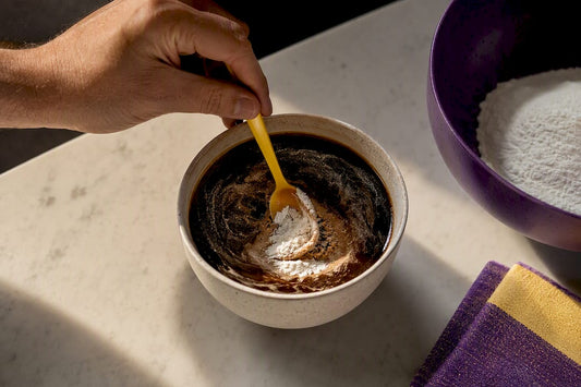 Creatine being stirred into fresh coffee