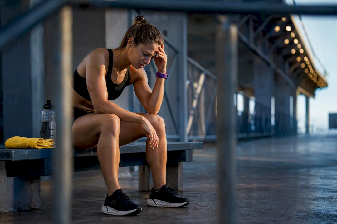Athlete managing caffeine withdrawal headache
