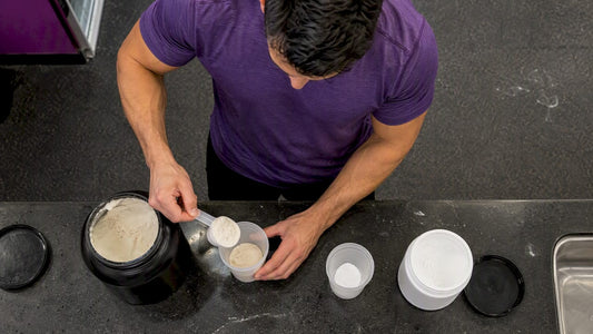 Athlete measuring protein and creatine powders